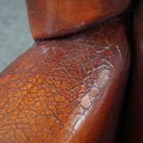Patinated sheepskin armchair