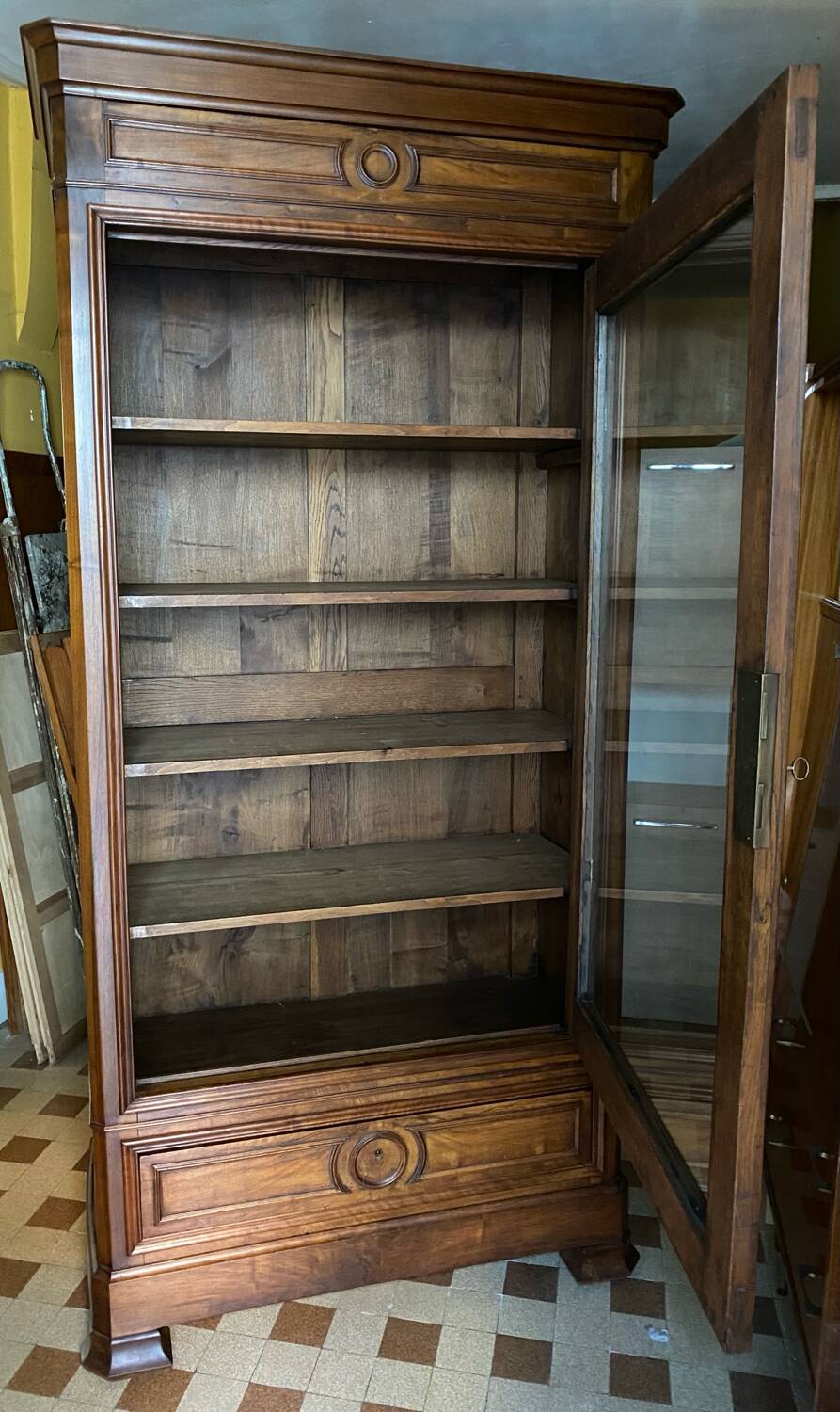 Walnut display cabinet with drawer