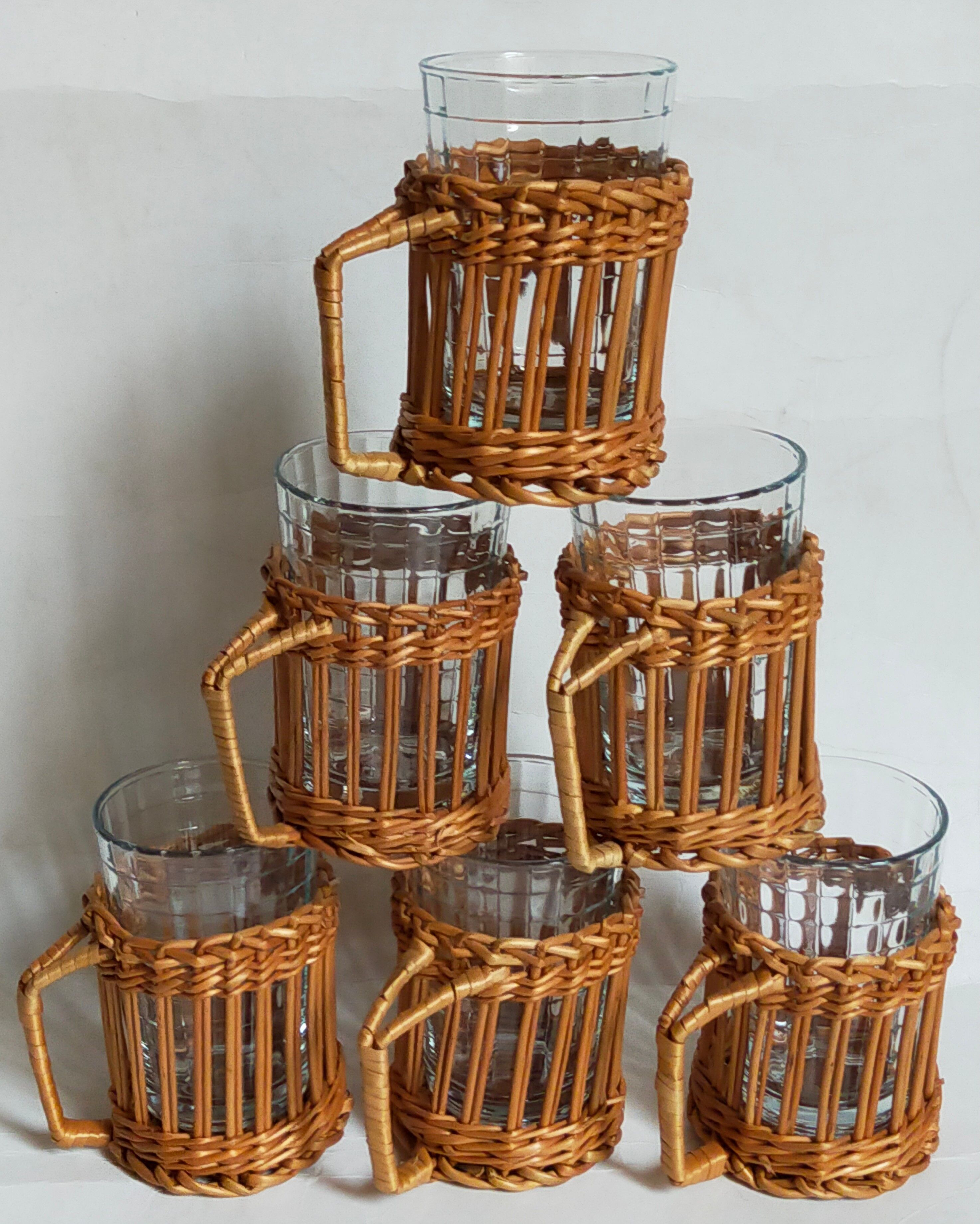 Six vintage 50s glasses in braided rattan cases