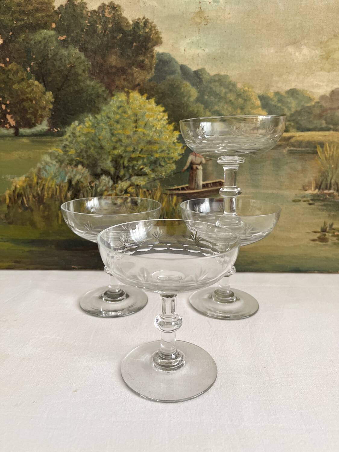 4 antique champagne glasses in engraved glass decor
