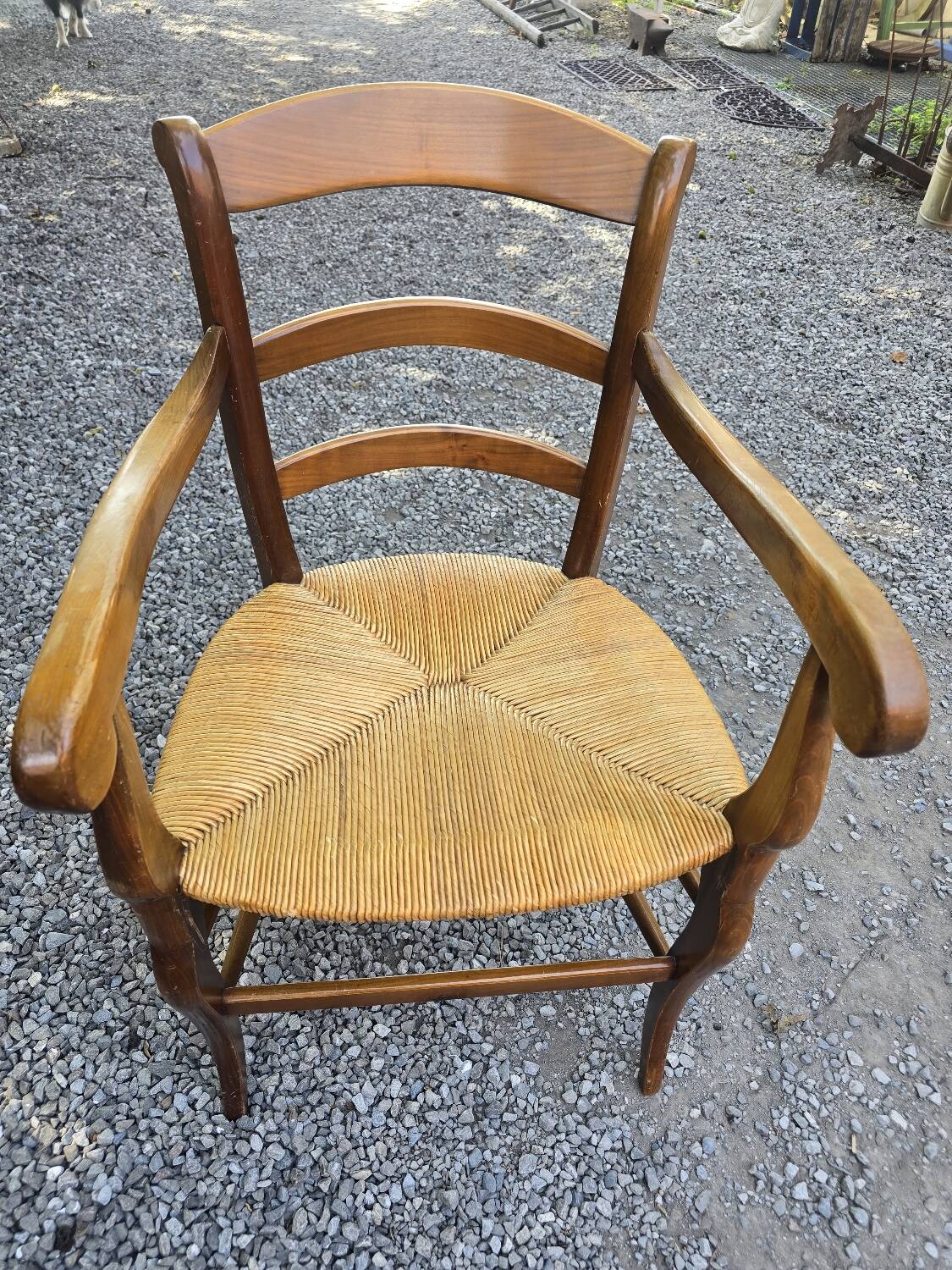 Cherry wood straw armchair