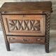 Small storage cabinet in carved oak – circa 1930
