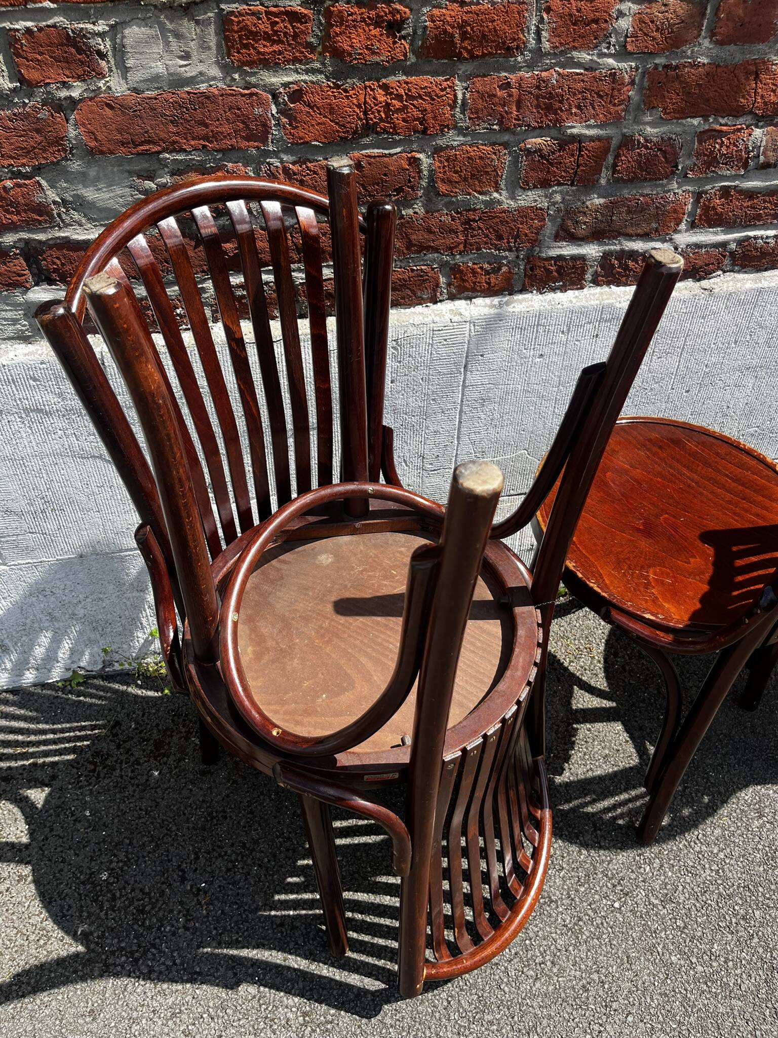 Lot of 4 vintage bistro chairs with slats in Thonet style.