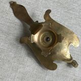 Bronze hand candlestick in the shape of a peacock