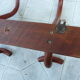 Coat rack with four double curved wooden pads