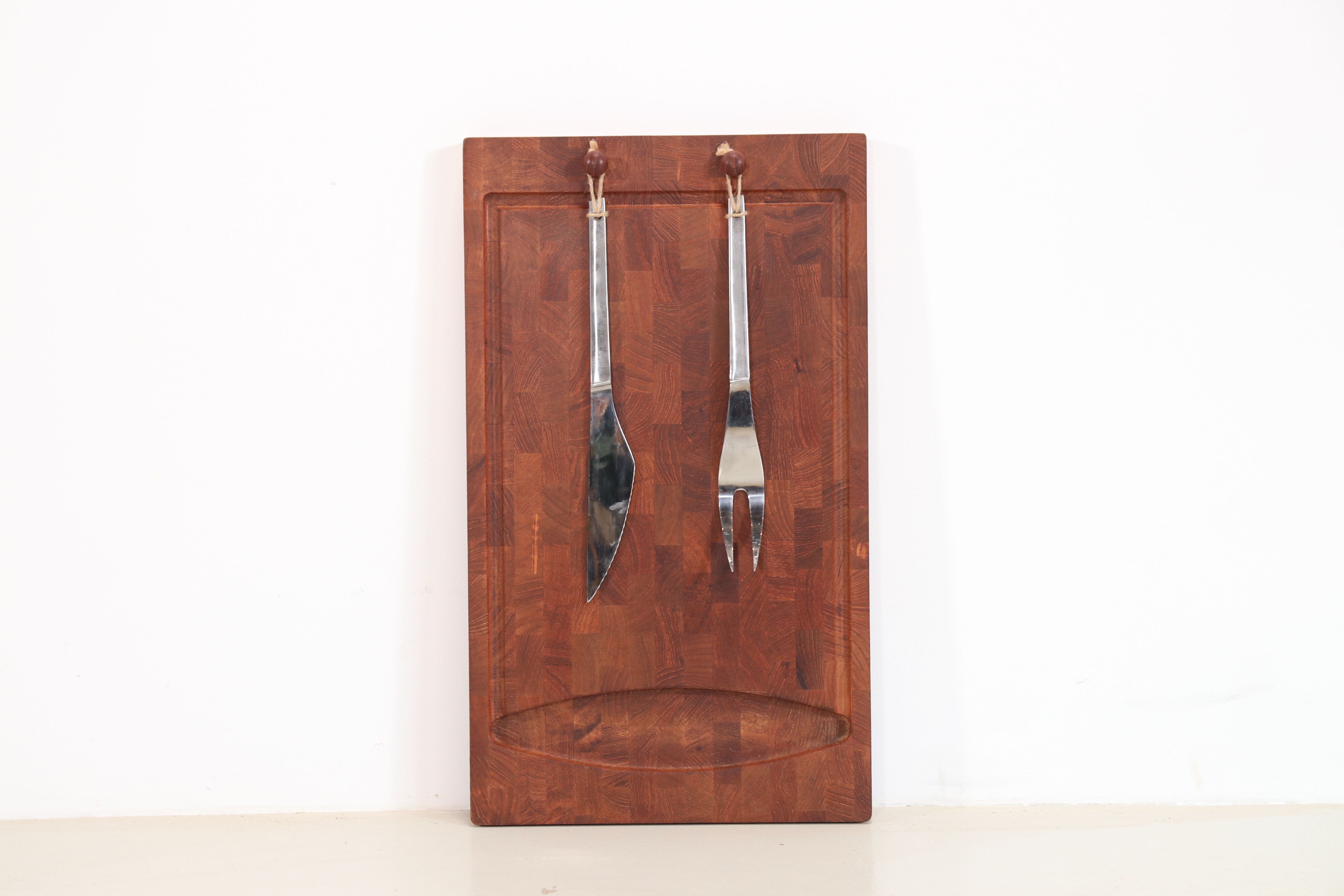 Danish cutting board and cutlery by Jens Quistgaard for Digsmed