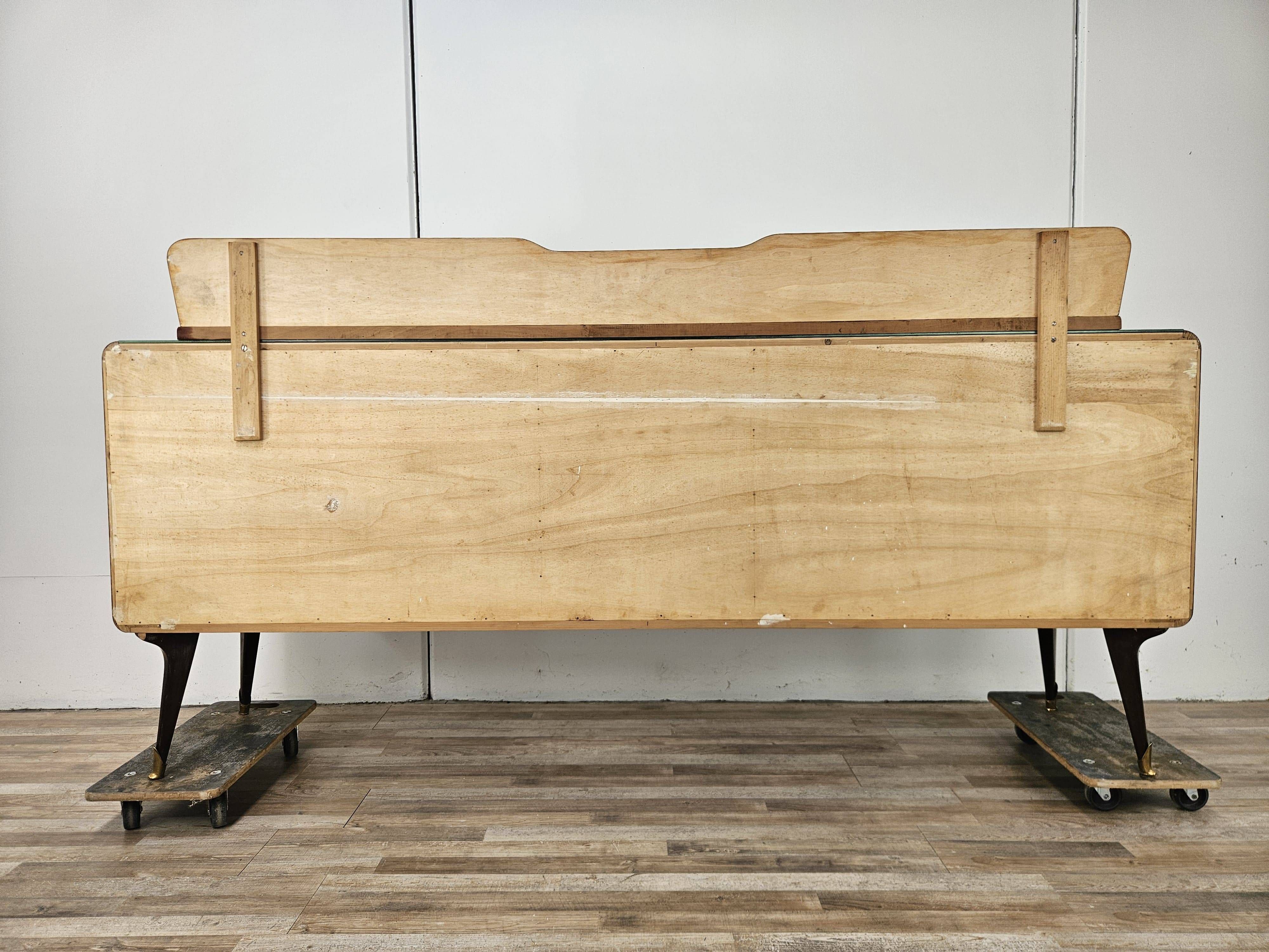 Mahogany sideboard with a glass top, 1960