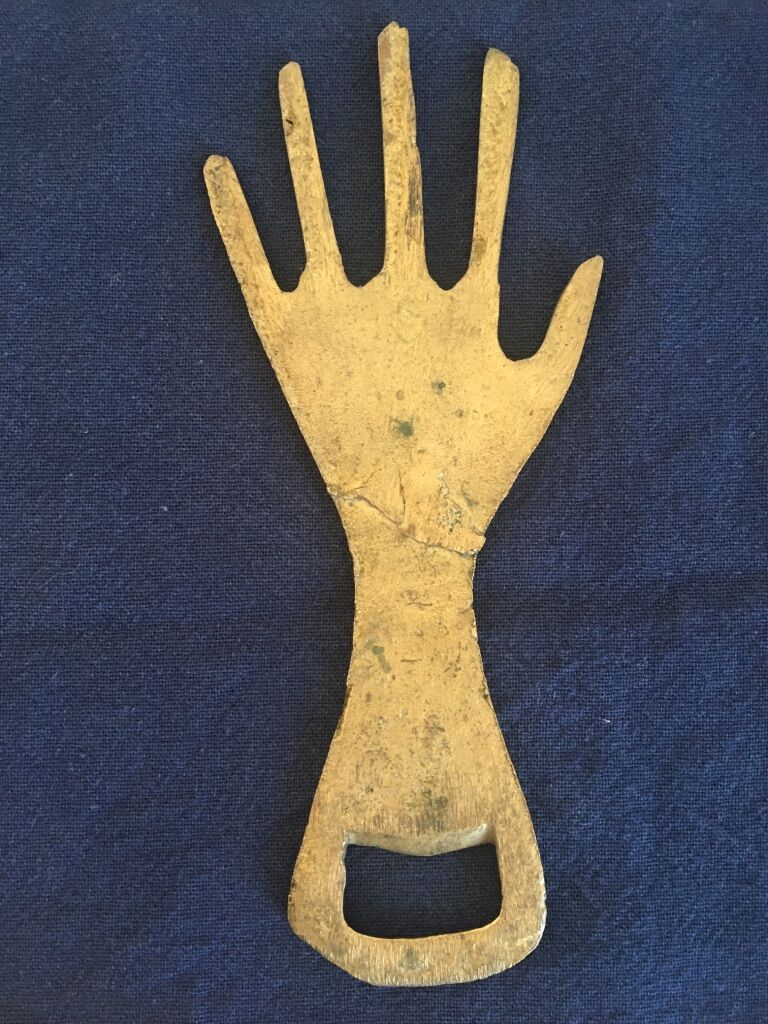 Hand-shaped brass stripper