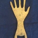 Hand-shaped brass stripper