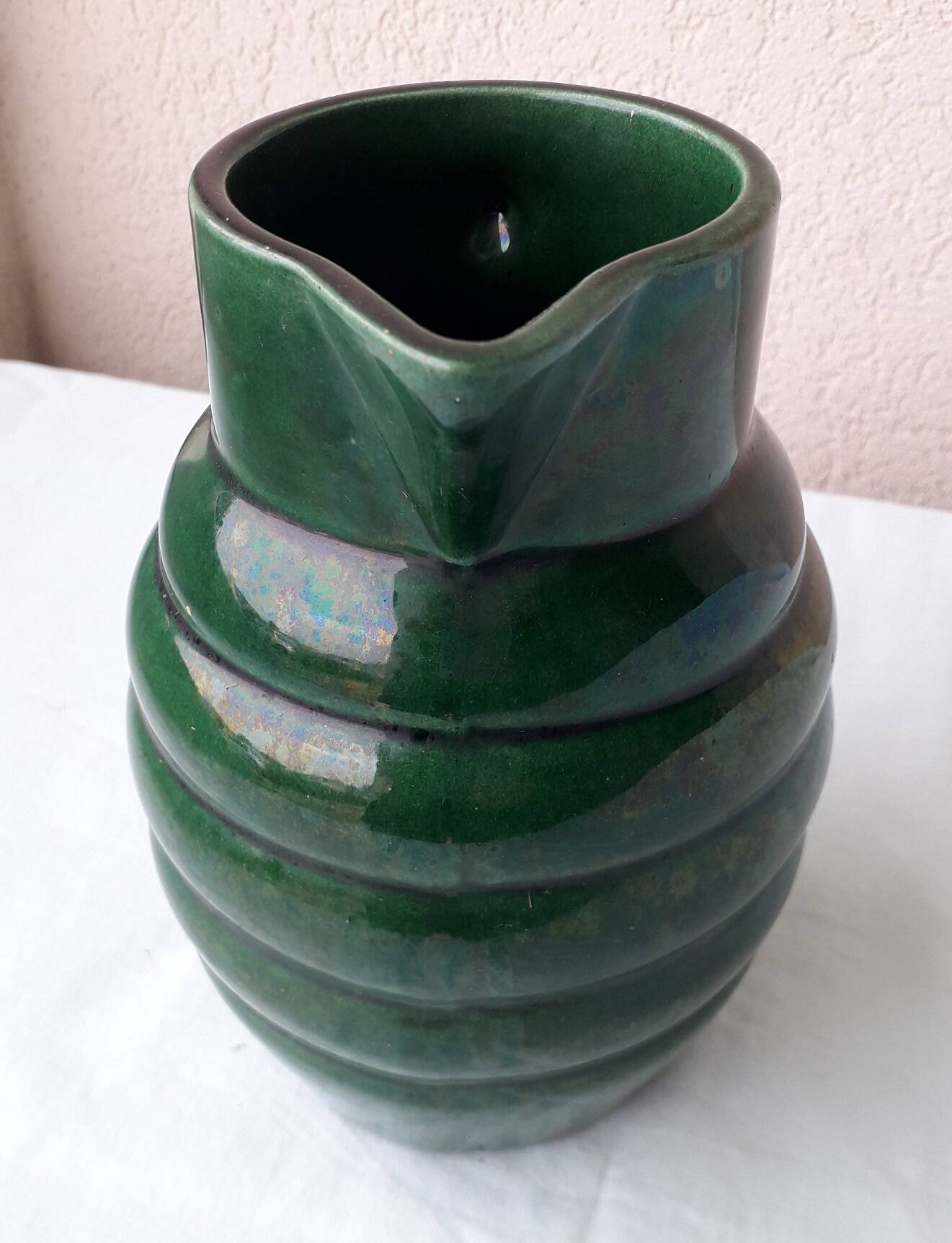 Green ceramic pitcher