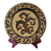 Vintage glazed terracotta plate from Dauphiné with foliage decoration.