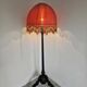 Antique floor lamp in carved oak, Austria late 1890s.