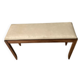 Piano bench that converts into a music book storage in excellent condition.