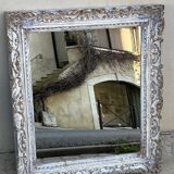 Carved wooden mirror