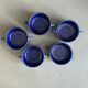 Set of 5 blue Klein ceramic tea cups with saucers.