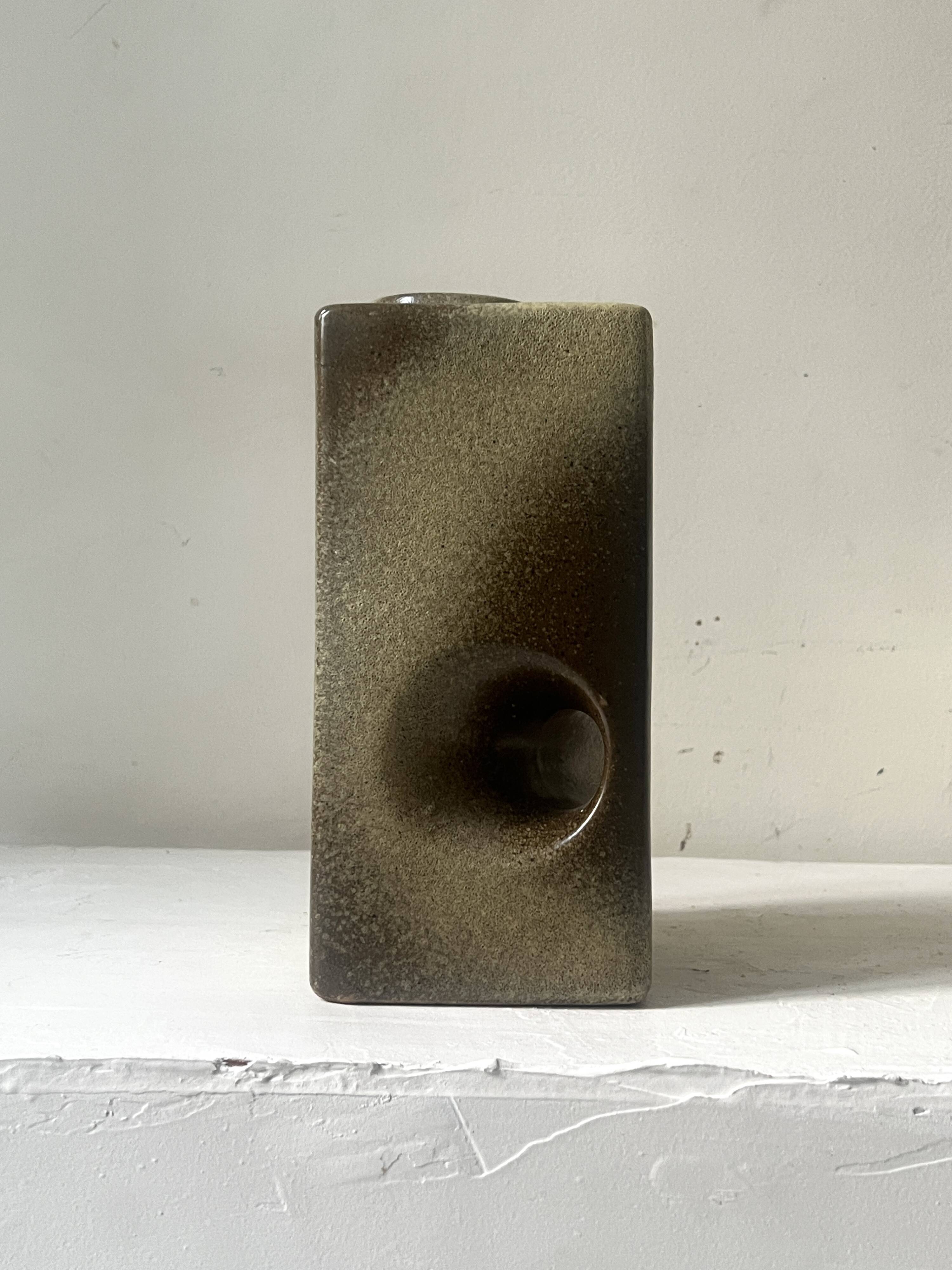 The modernist vase is German, VEB Haldensleben Fat Lava 1970.
