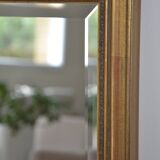 Beveled golden mirror
