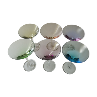 Glasses on foot with ice or coktail or fruit... pastel multicolor