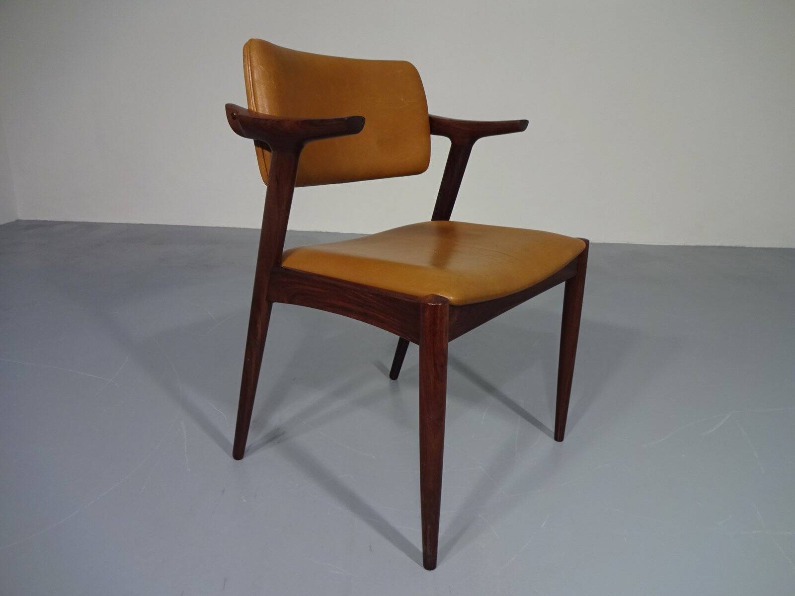 Rosewood and leather armchair from GM, 1960s