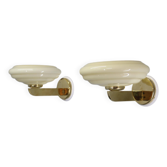 Pair of 1940s Czechoslovak Art Deco brass wall lights with opaline glass shades