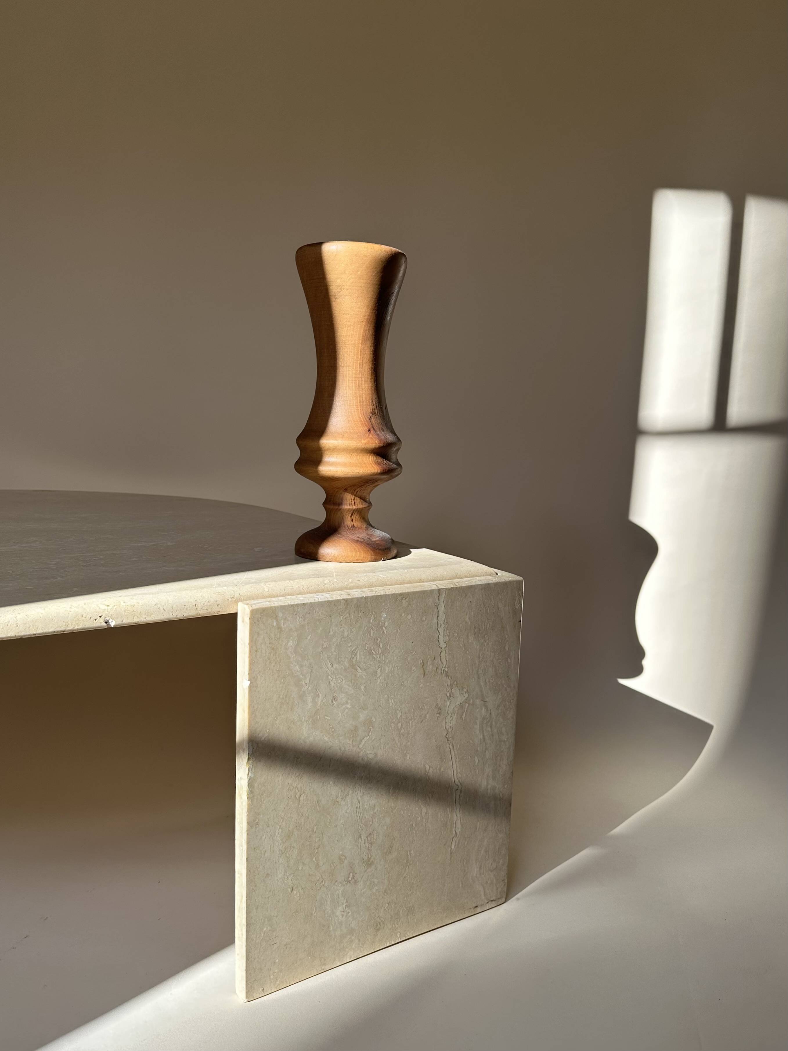 Travertine eye-shaped coffee table