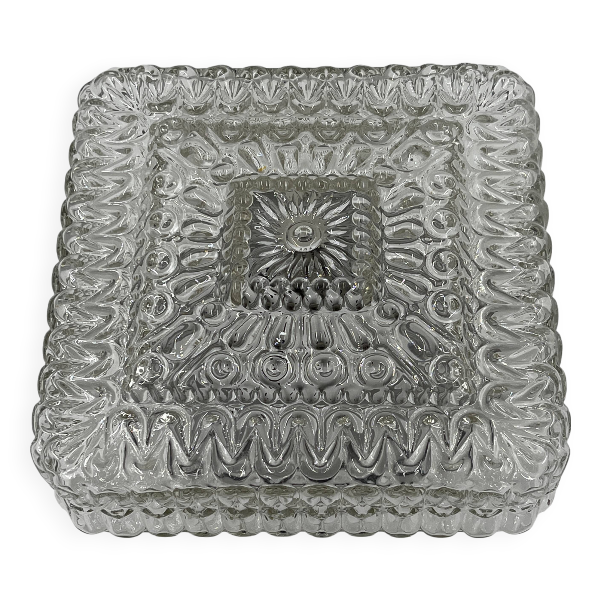 Square ceiling light in embossed molded glass