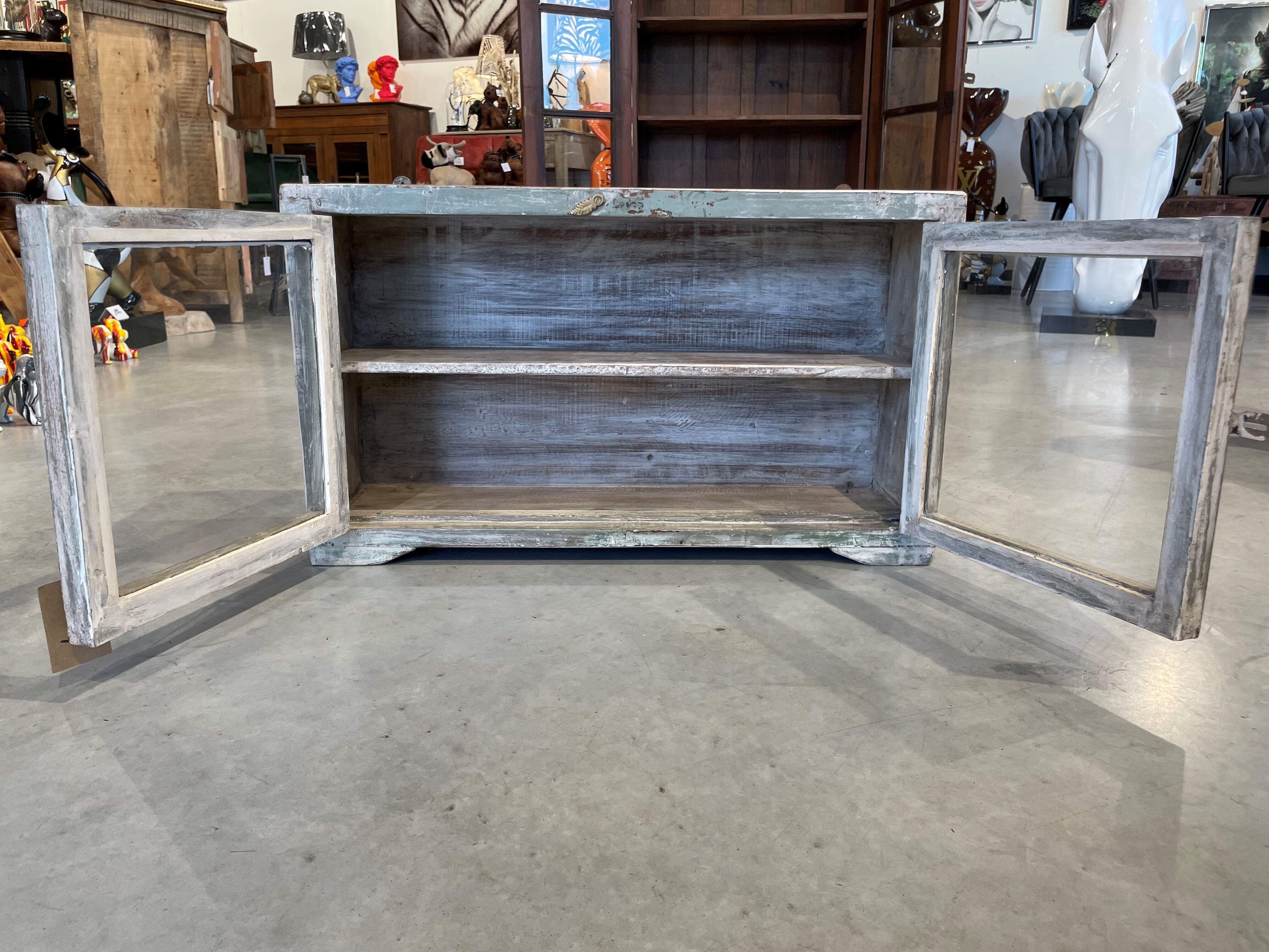 Small teak wall shelf