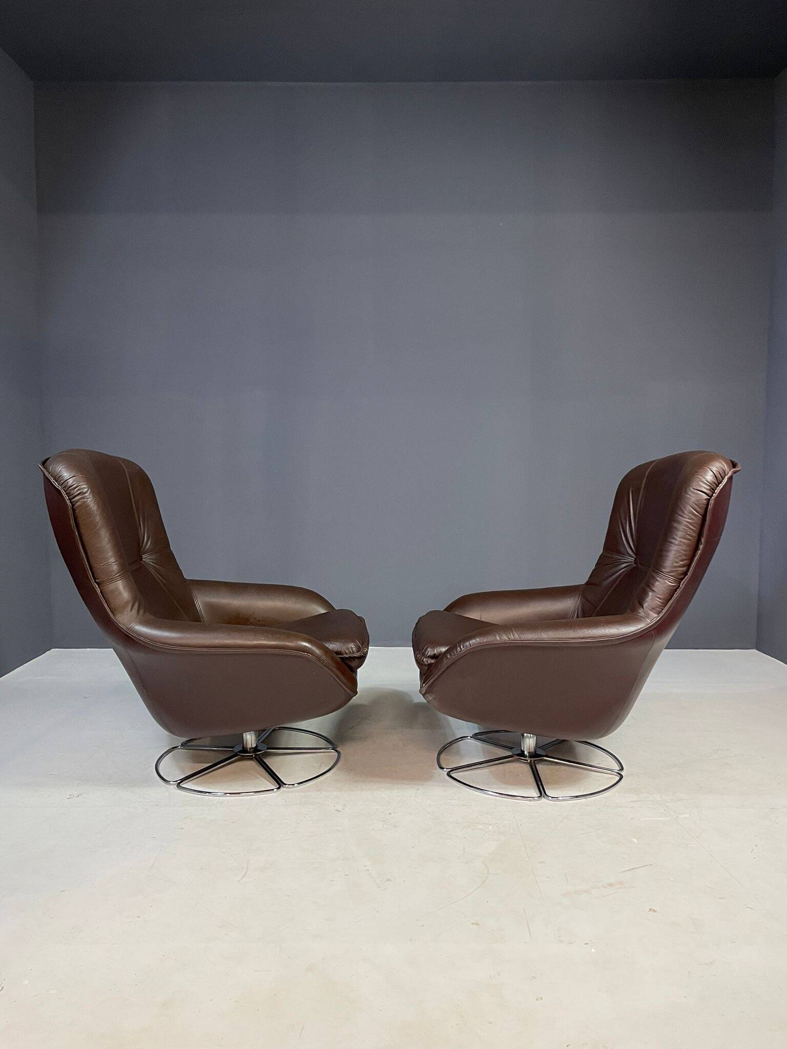 Pair of leather swivel armchairs by PEEM, Finland, 1970s