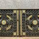 pair of monogrammed cast iron doors from the Art Deco period