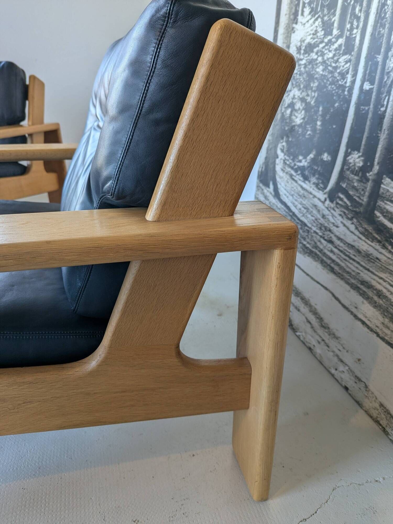 Pair of raw oak and leather armchairs by Esko Pajamies for Asko, Finland.