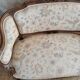 Small sofa or bench in Louis XV style, rococo.