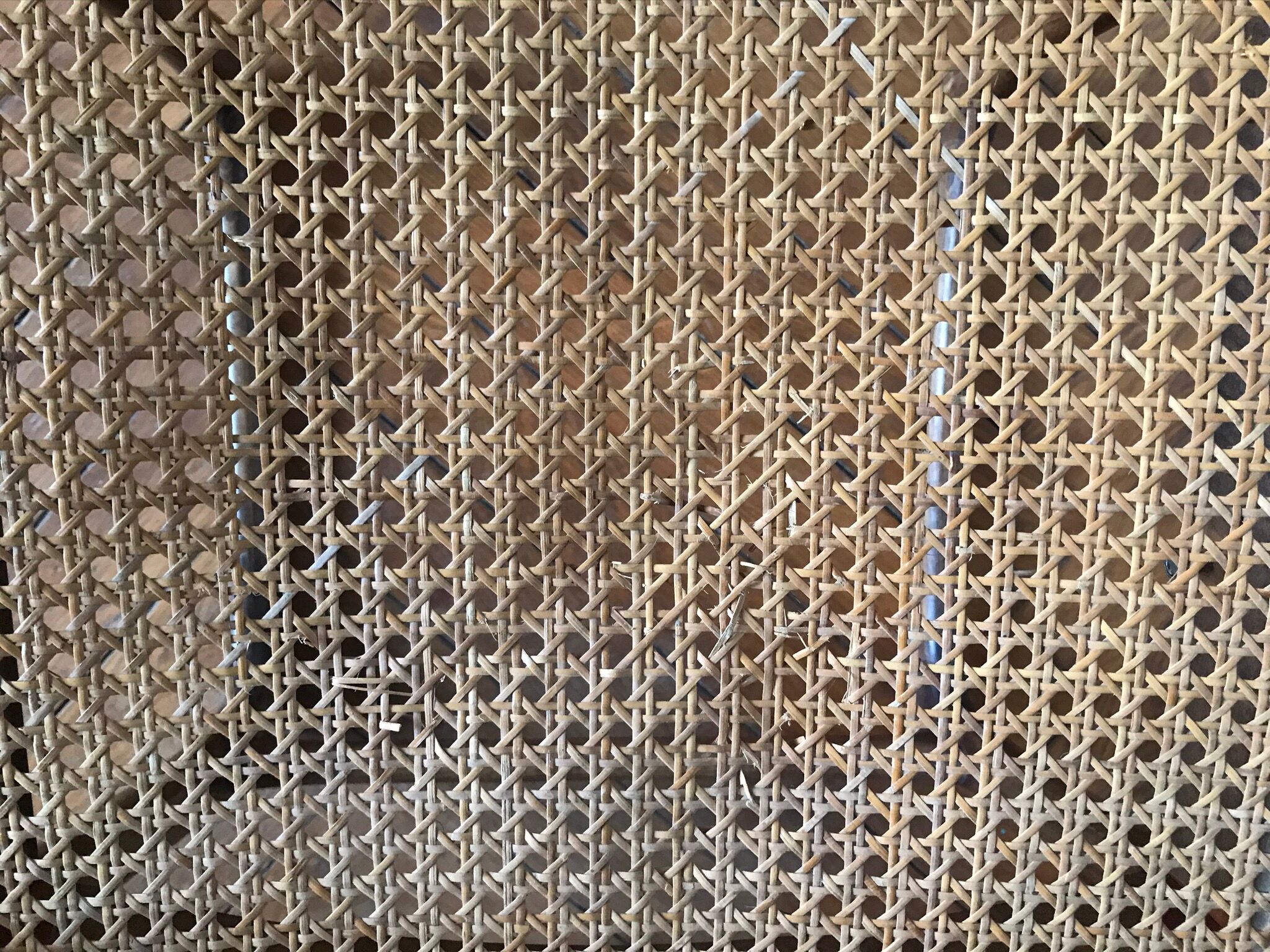 Series of 4 sleigh chairs in wicker, by Baumann