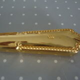 Golden metal pie shovel