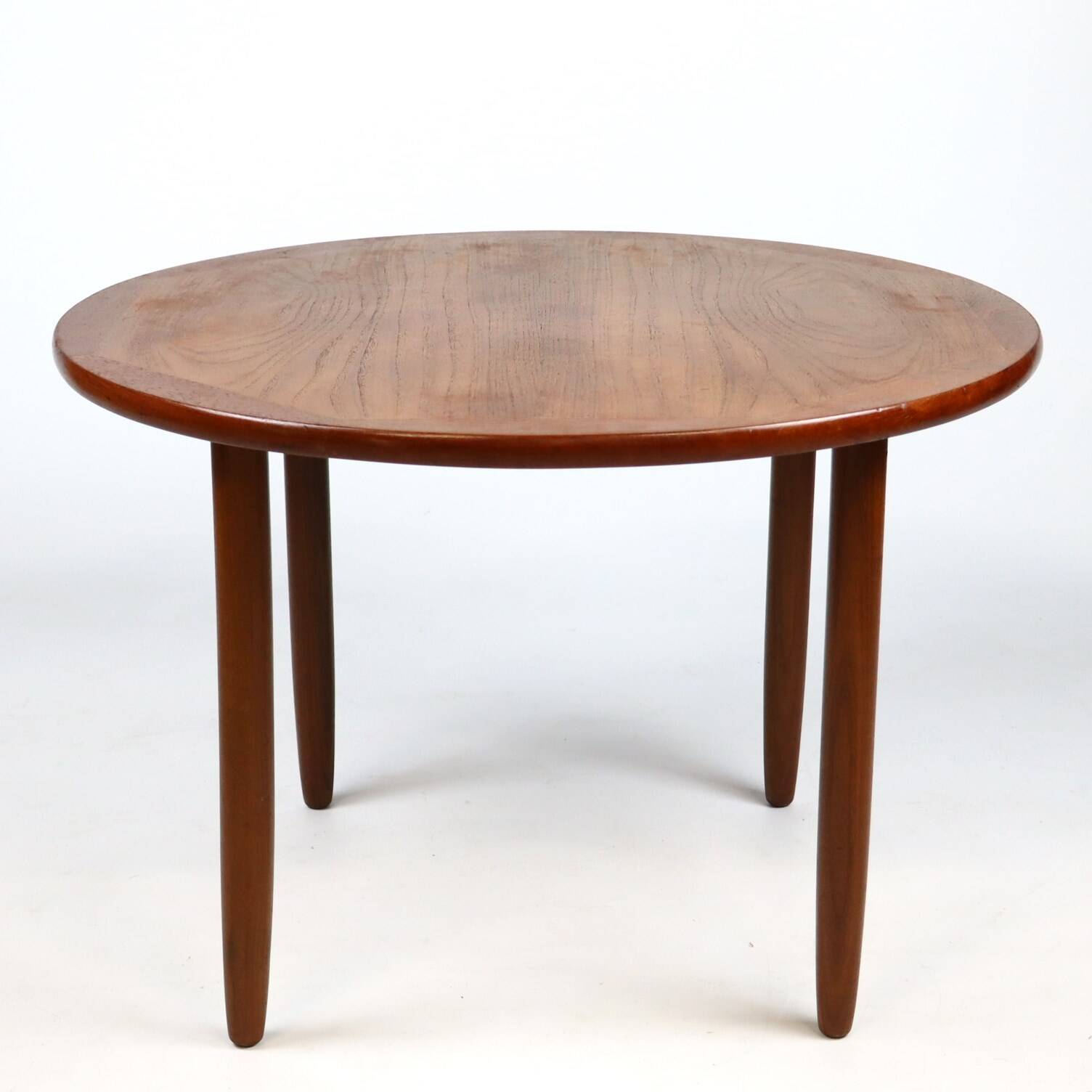 Round teak coffee table