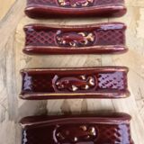 Set of 9 vintage earthenware knife holders