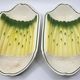 Salins earthenware slip dish decorated with asparagus, French, yellow and green, 20th century