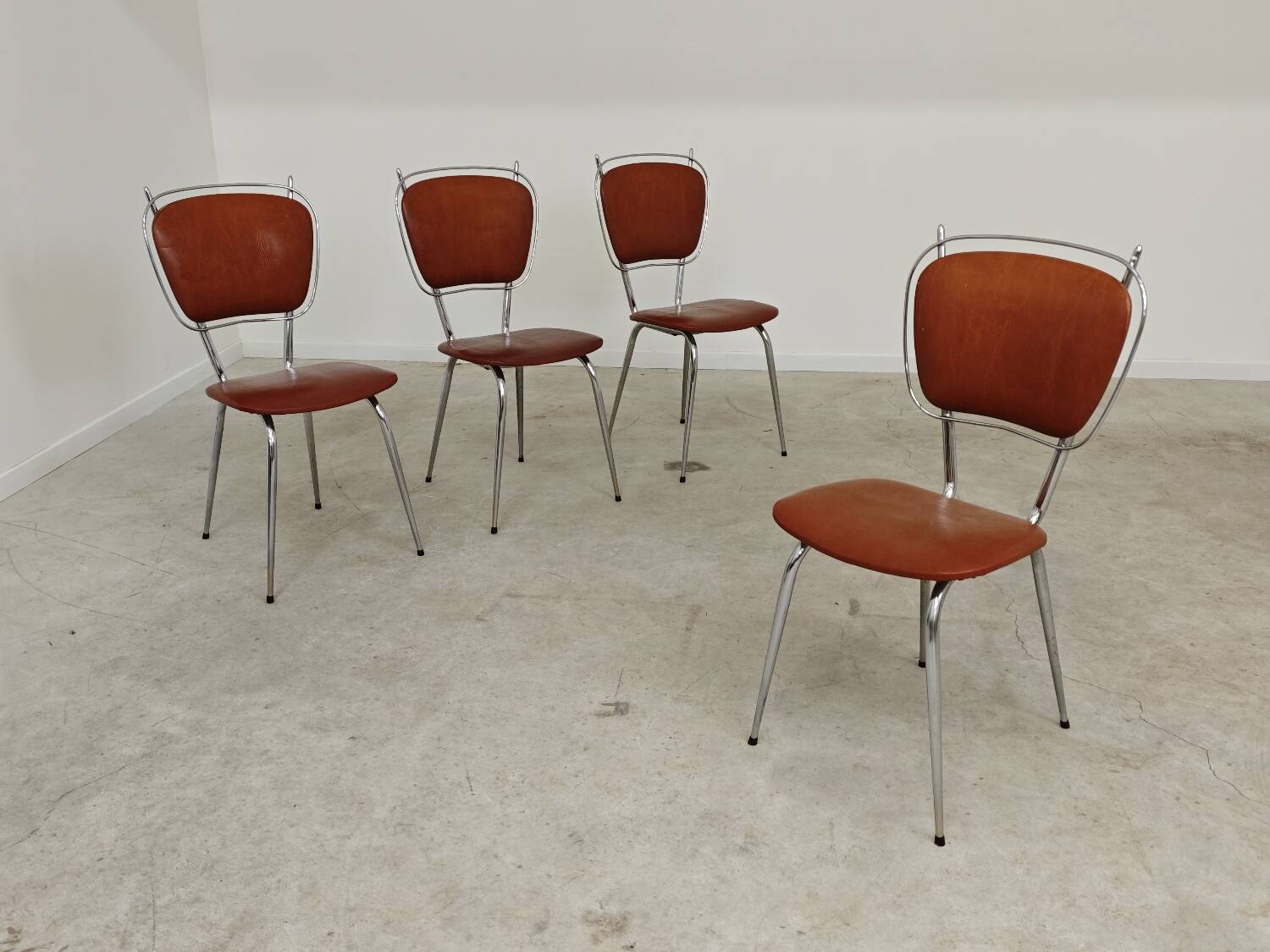 Set of 4 French chairs in camel brown imitation leather and chrome 1960