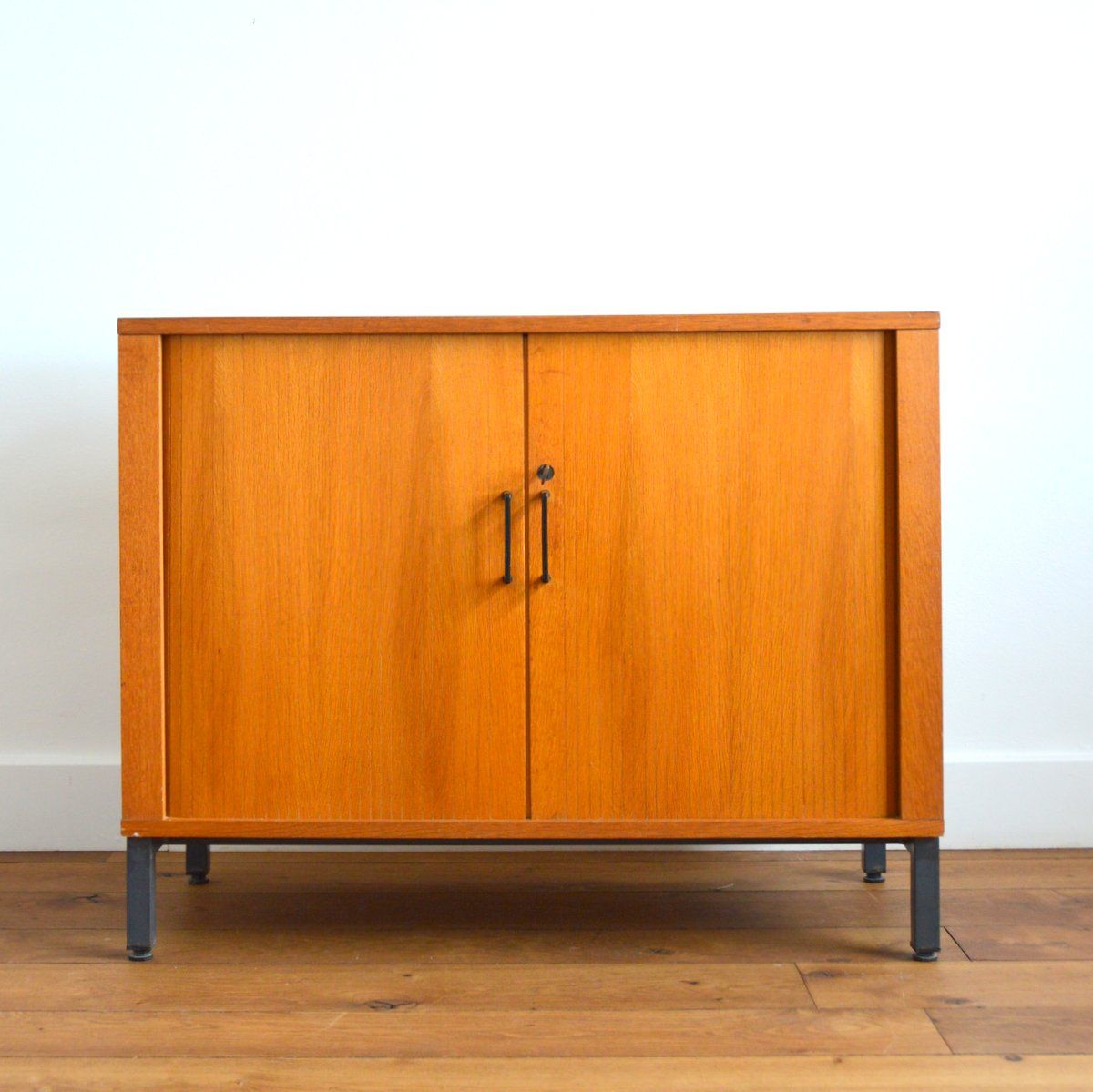 Storage cabinet with sliding curtain shutter 1950s