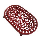 Dessous de plat en fonte émaillée rouge ancien