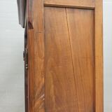 Walnut glazed bookcase with nineteenth century rose window