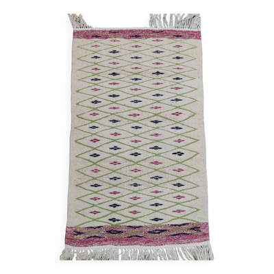 Tapis à motifs géométriques fait main en laine naturelle