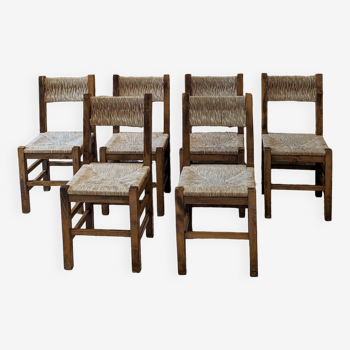 Six straw chairs