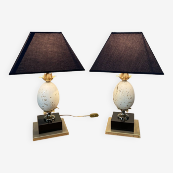 Pair of designer ostrich egg lamps in travertine from maison barbier