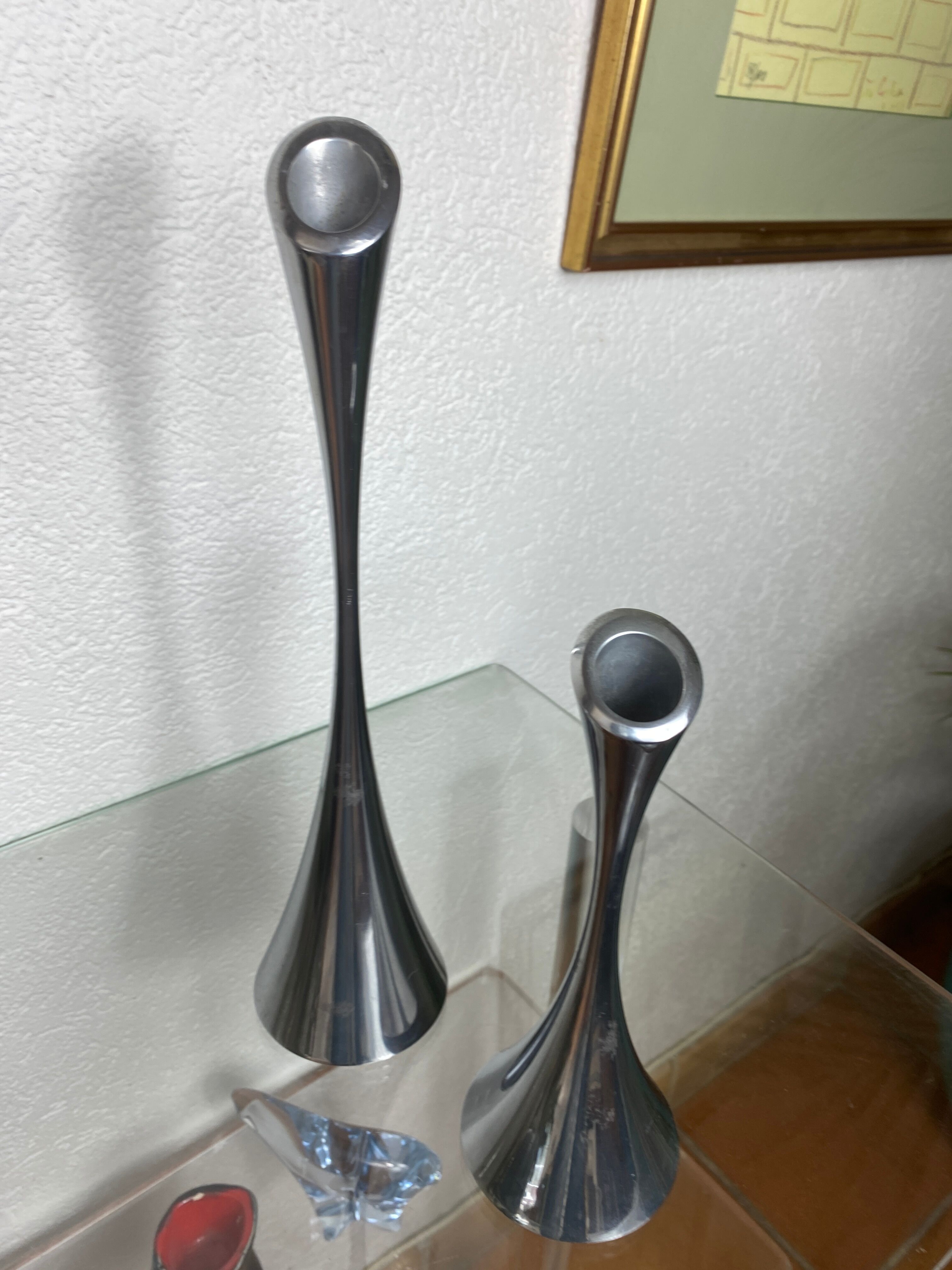Pair of designer candle holders in stainless steel