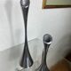 Pair of designer candle holders in stainless steel