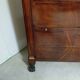 Mahogany chest of drawers – Empire / Restoration period – Black marble and bronze