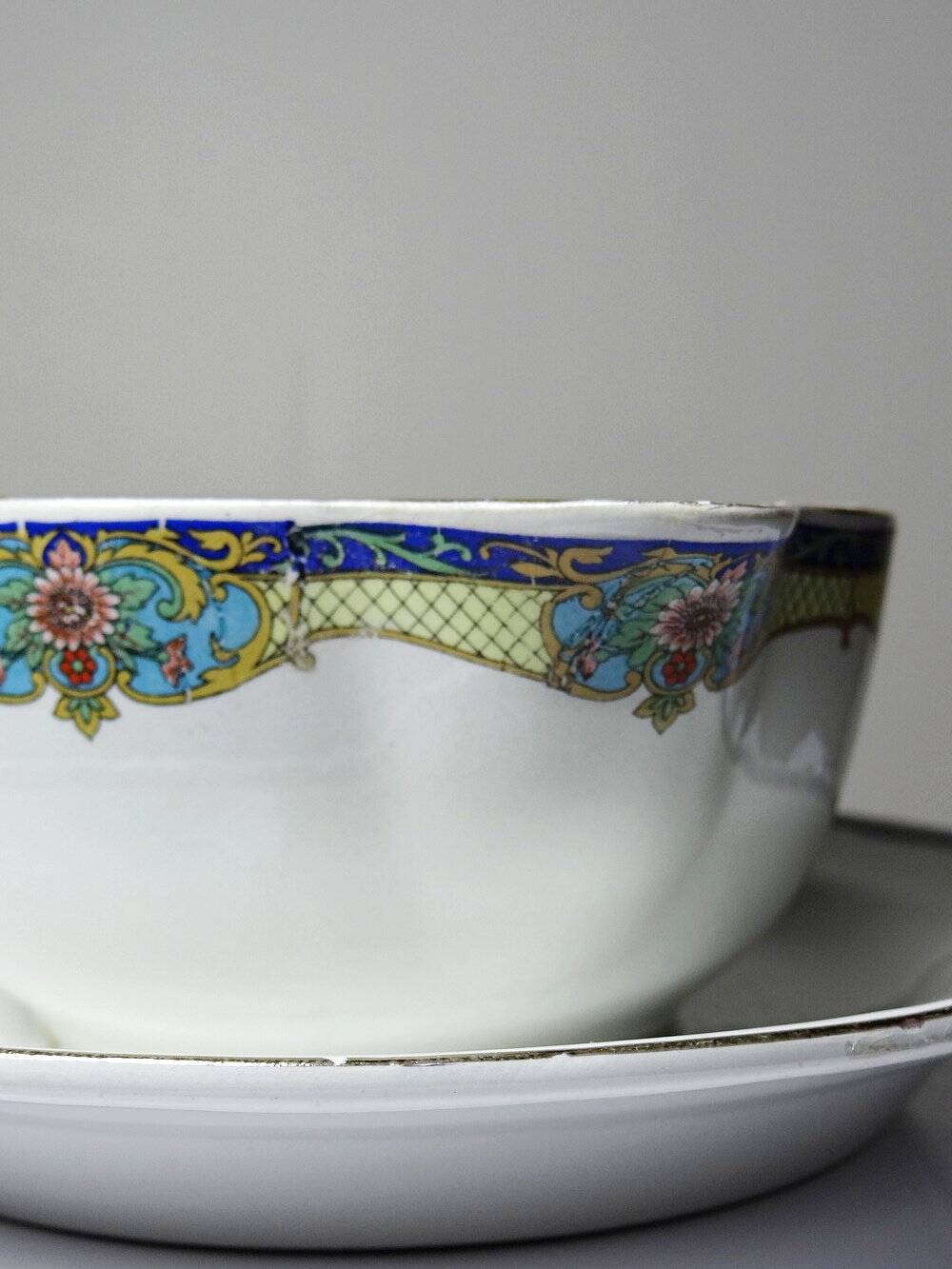 Old Luneville sauce boat, opaque porcelain with polychrome decoration.