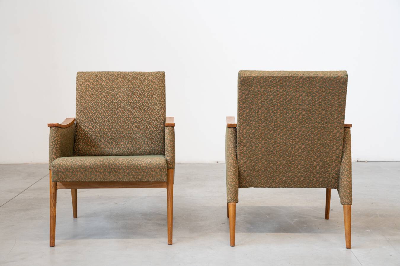 Pair of vintage armchairs in oak and embossed fabric, with old republished certificate of authenticity