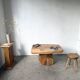 Organic brutalist coffee table in solid cedar, trunk pedestal, 1970s.