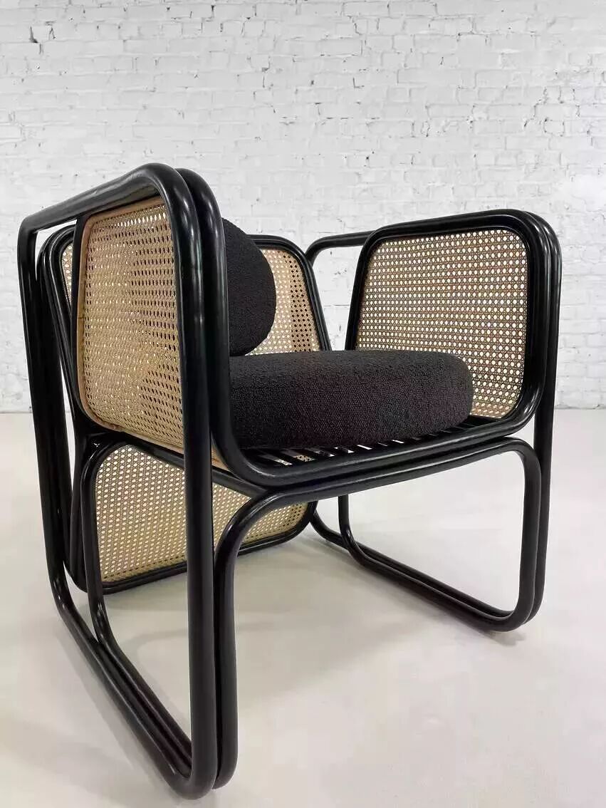 Cubic armchair in black rattan and canework